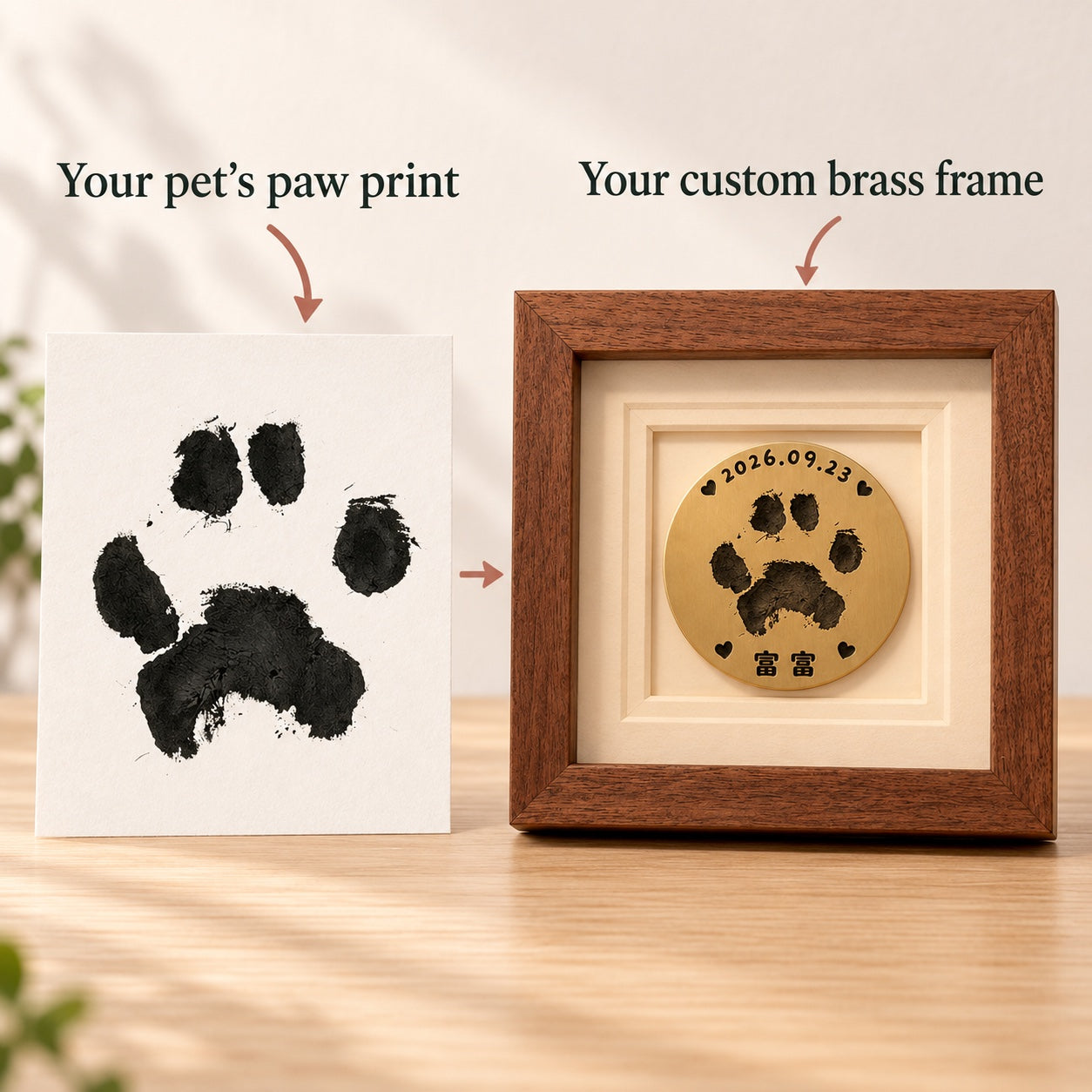 An example paw print beside its custom brass frame, showing the print recreated on the round brass plaque.