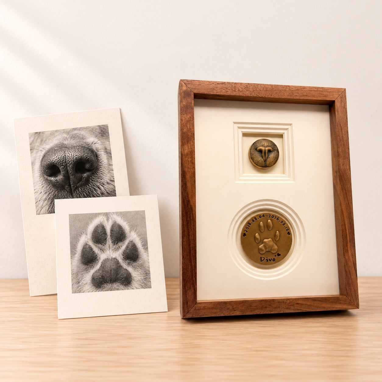 Example nose and paw reference photos beside the completed two-disc brass frame.