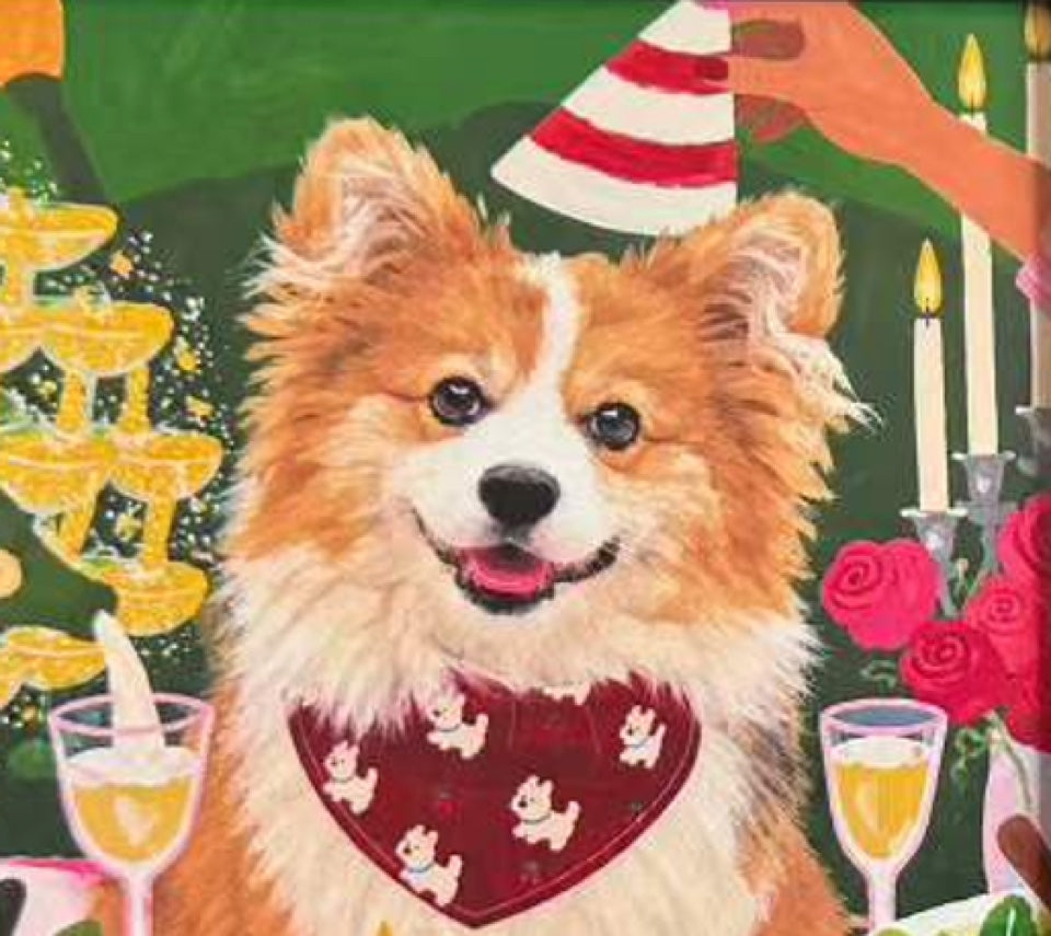 Birthday portrait of the same tan and white dog with a red bandana